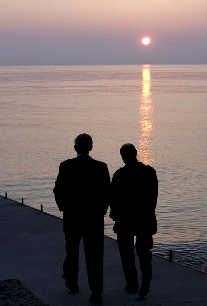 Putin watches a sunset with a friend 
