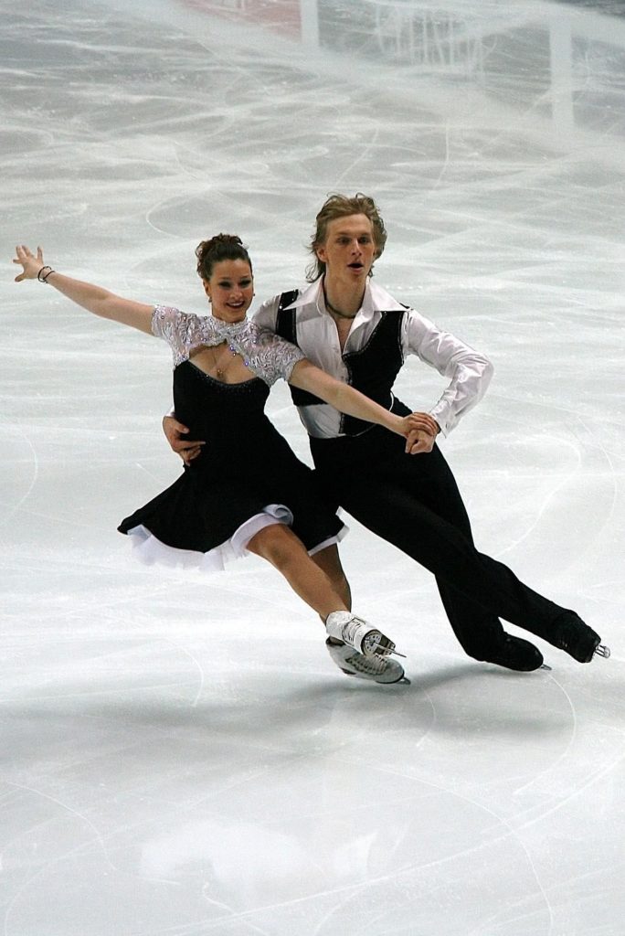 Two figure skaters move in harmony