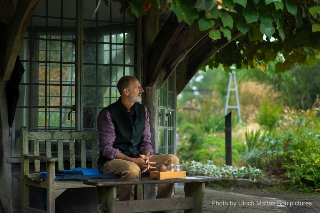 Richard Rudd in a garden